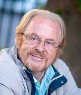 DR CHRIS ANDREW